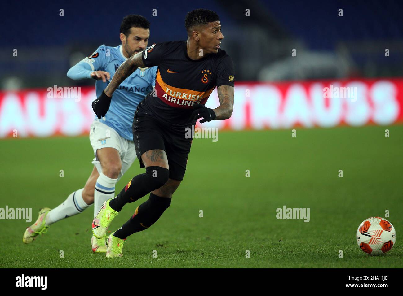 Rome, Italy. 07th Nov, 2019. Rome, Italy - 09.12.2021: PEDRO (LAZIO), P.VAN AANHOLT (GAL), in action during the Uefa Europa League Group E soccer match between SS Lazio and Galatasaray, at Olympic Stadium in Rome. Credit: Independent Photo Agency/Alamy Live News Stock Photo