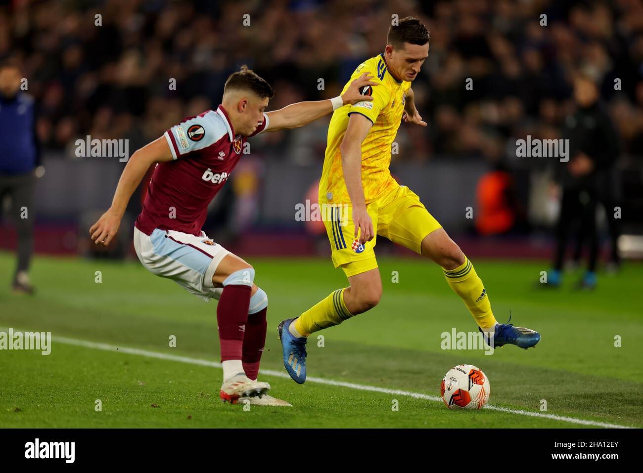 London Stadium, London, UK. 9th Dec, 2021. Europa League football West Ham versus Dinamo Zagreb; Harrison Ashby of West Ham United competes for the ball with Daniel Stefulj of GNK Dinamo Zagreb Credit: Action Plus Sports/Alamy Live News Stock Photo
