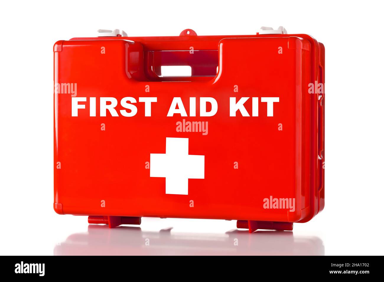Red first aid medical kit box standing over white background Stock ...