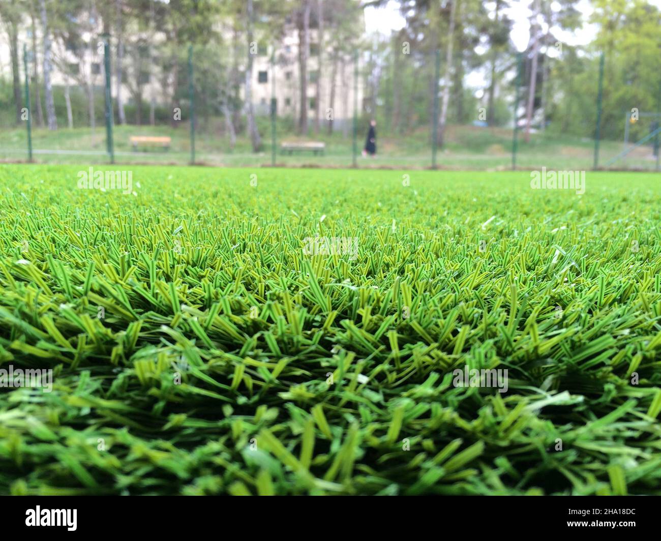 A football pitch made from artificial fake grass on one of many pitches replaced with plastic grass in the city of Stockholm Stock Photo