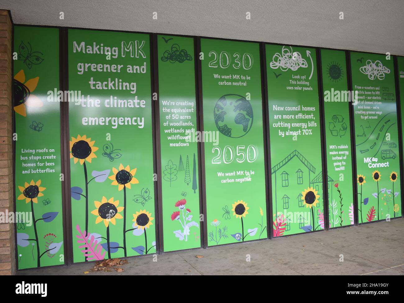 Billboard about the climate emergency at MK Council offices in Central Milton Keynes. Stock Photo