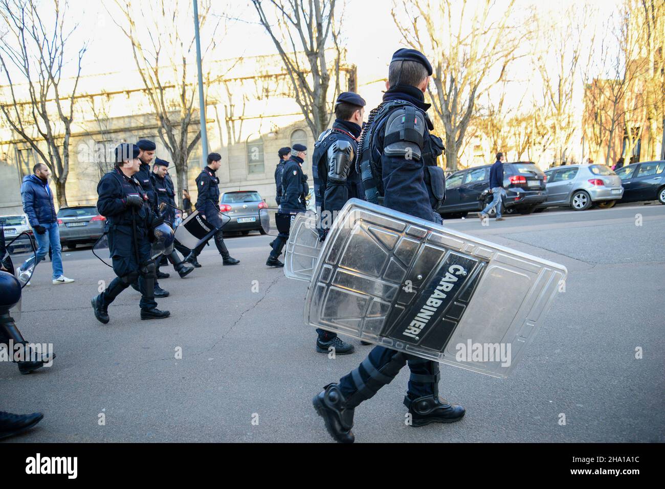 02-22-2014  Milan .   Carabineries ( policemen ) in Milan on some demonstation : young and old men   in with , protective  ammunition and  shields Stock Photo