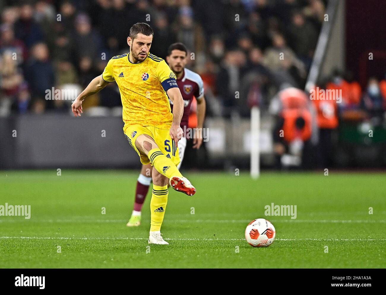 BUDAPEST, HUNGARY - AUGUST 13: (l-r) Tokmac Chol Nguen of Ferencvarosi TC  wins the ball from Arijan Ademi of GNK Dinamo Zagreb during the UEFA  Champions League Third Qualifying Round match between