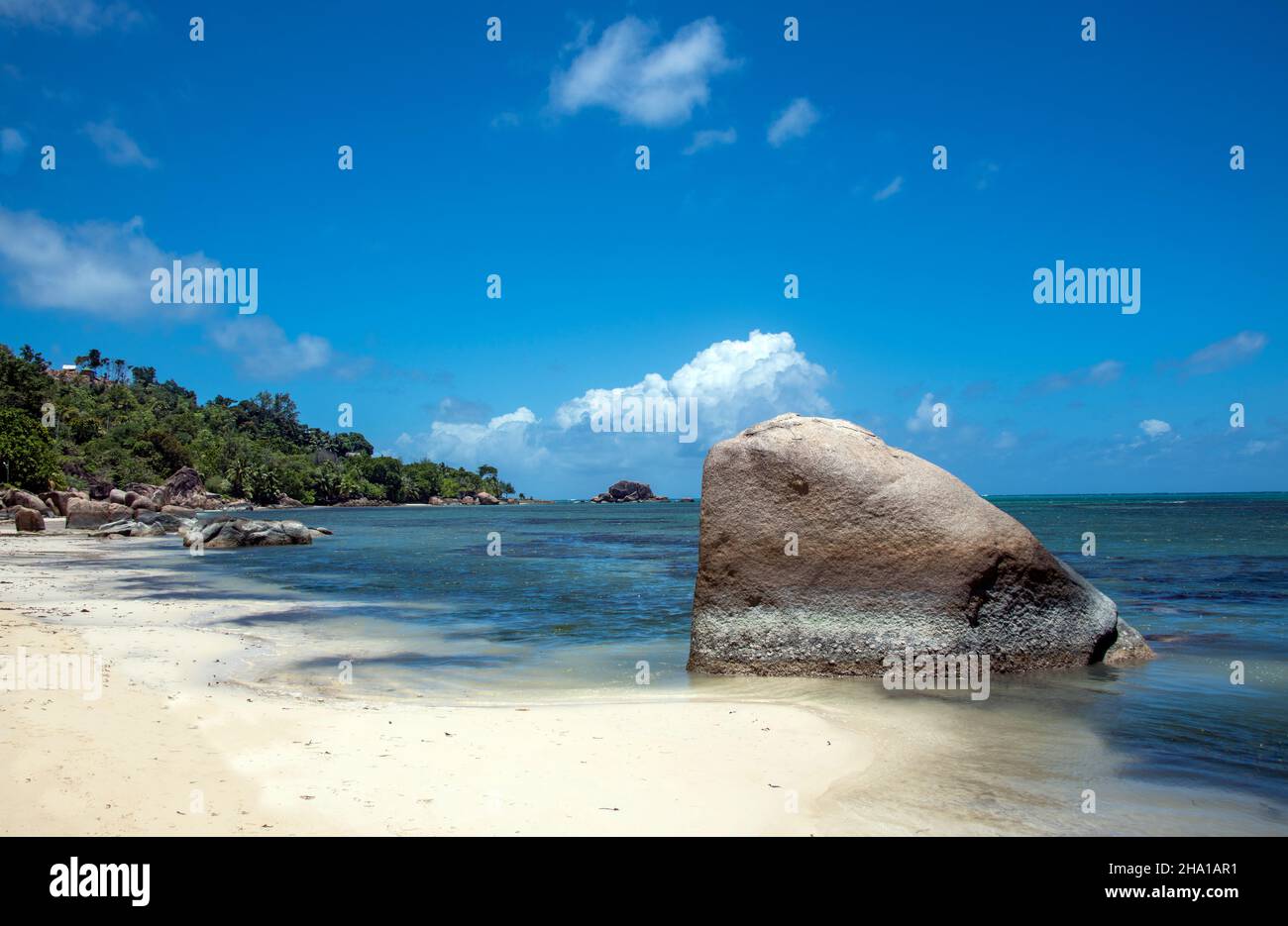 White sandy secluded beach Anse Citron or Lemon Bay Praslin Seychelles Stock Photo