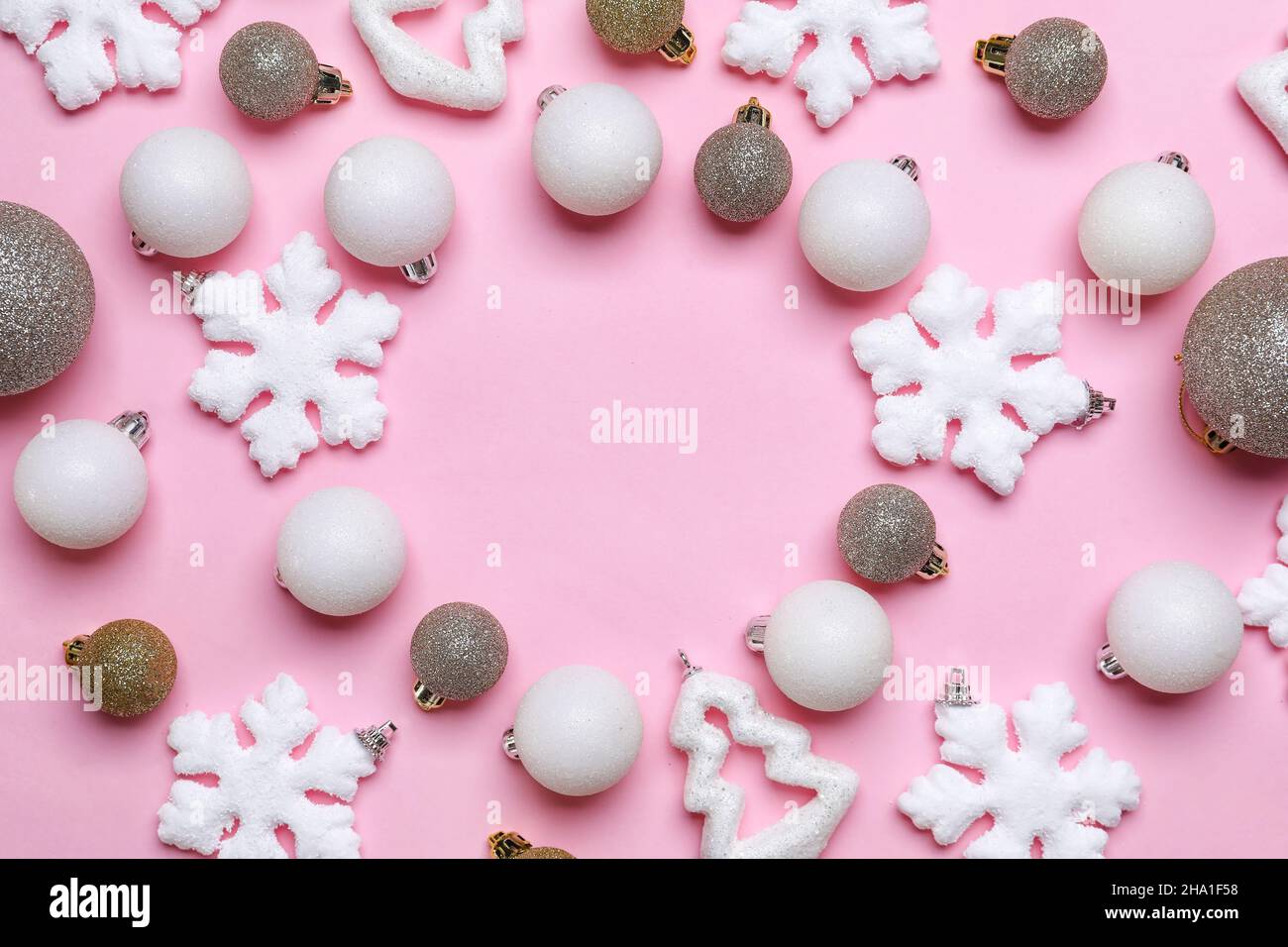 Frame made of Christmas decorations on pink background Stock Photo - Alamy