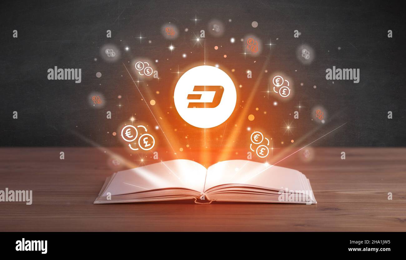 Open book with currency icons above Stock Photo - Alamy