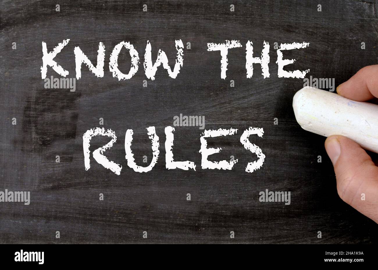 Blackboard with Know the Rules sentence handwritten Stock Photo Alamy