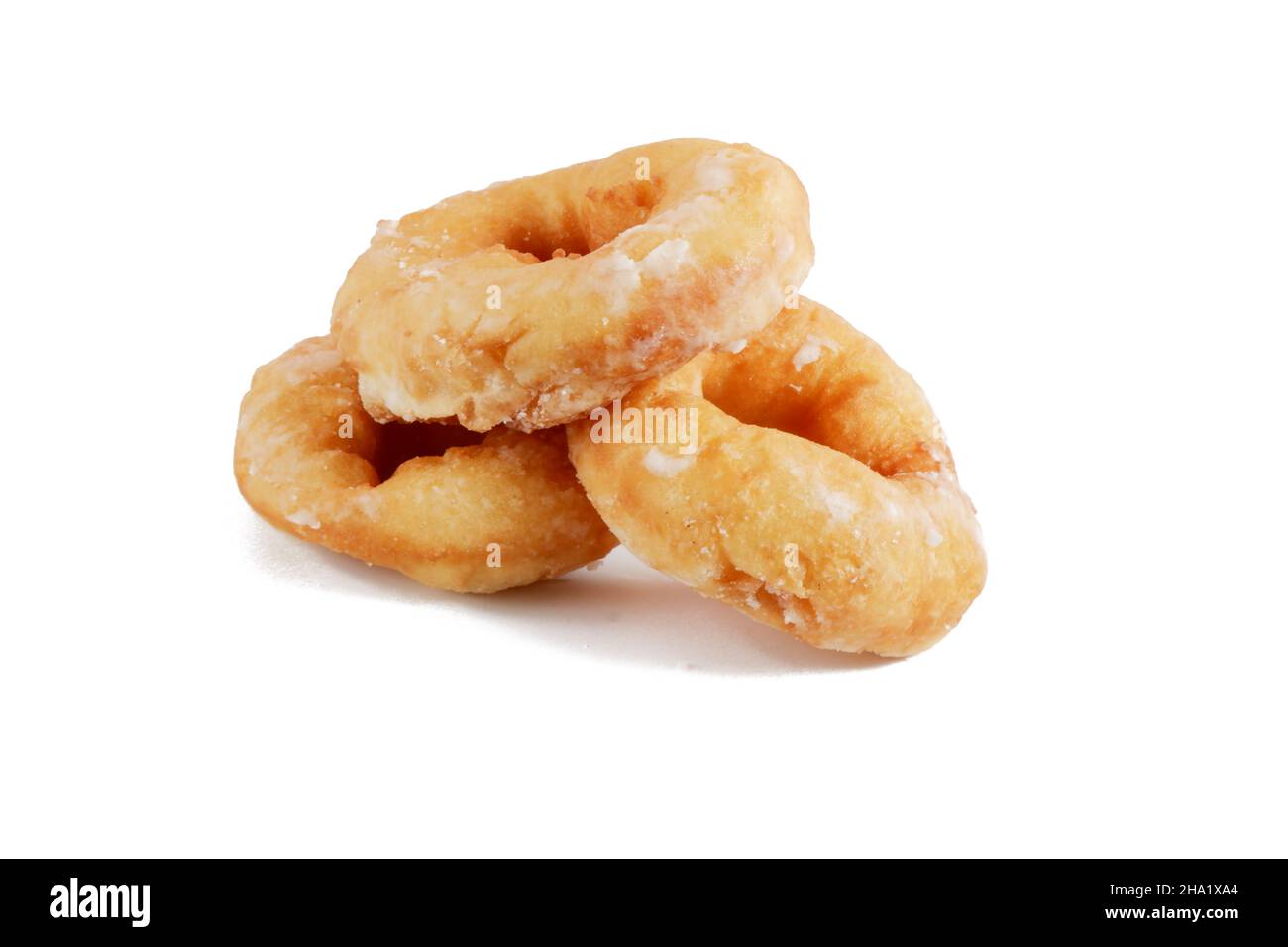 three fried donuts isolated on a white background. Stock Photo