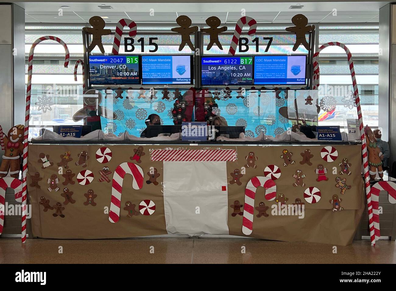 Christmas holiday decorations are seen at a Southwest Airlines ticket counter at the Sacramento International Airport, Thursday, Dec. 9, 2021, in Sacr Stock Photo
