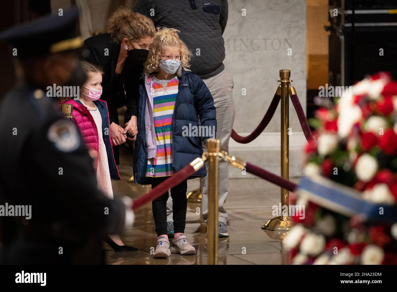 Washington, USA. 09th Dec, 2021. Guests pay their respects to former Senator Robert J. Dole (R-KS) as he lies in state at the Rotunda of the U.S. Capitol in Washington, DC on Thursday, December 9, 2021. (Photo by Sarahbeth Maney/Pool/Sipa USA) Credit: Sipa USA/Alamy Live News Stock Photo