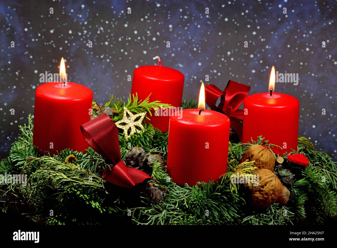 advent wreath with 3 burning candles Stock Photo - Alamy