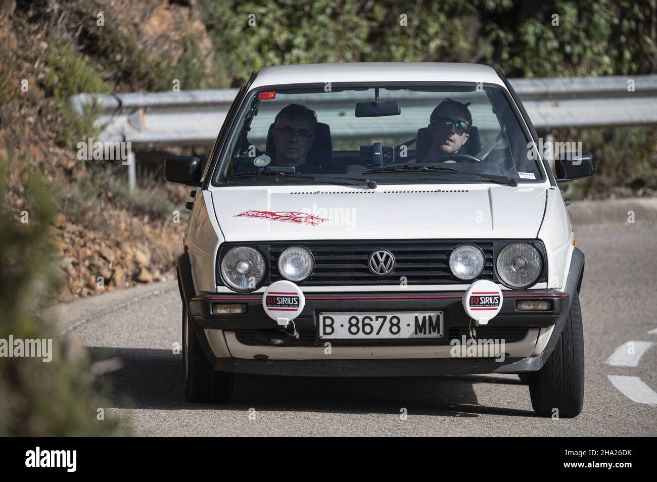 BARCELONA, SPAIN - Nov 11, 2021: A man driving Volkswagen Golf Mk2 ...