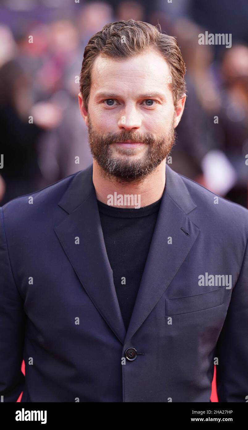 File photo dated 12/10/21 of Jamie Dornan who has said he has heard of 'absurd fan theories' surrounding the Fifty Shades films, including that he and co-star Dakota Johnson have children together. The Northern Irish actor, 39, played billionaire Christian Grey alongside Johnson, who starred as Anastasia Steele in the film trilogy adapted from author EL James' steamy books. Appearing on The Jonathan Ross Show, Dornan, who shares three daughters with his wife, singer-songwriter Amelia Warner, quipped that he already has enough children to deal with. Stock Photo