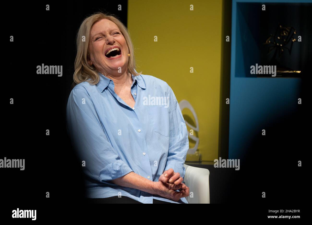 Berlin, Germany. 09th Dec, 2021. Maren Kroymann, actress and comedienne, laughs during the recording of the show 'Fernsehsalon' at the Deutsche Kinemathek - Museum für Film und Fernsehen. Kroymann is the inaugural guest of the new format 'Fernsehsalon', which can be seen online from 13.01.2022 on the website of the Kinemathek, on the Berlin channel Alex and on other platforms. Credit: Monika Skolimowska/dpa-Zentralbild/dpa/Alamy Live News Stock Photo