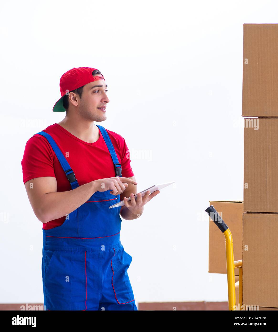 The contractor worker moving boxes during office move Stock Photo