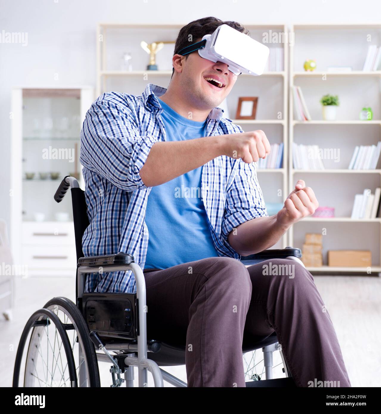 The disabled man studying with virtual reality glasses Stock Photo Alamy