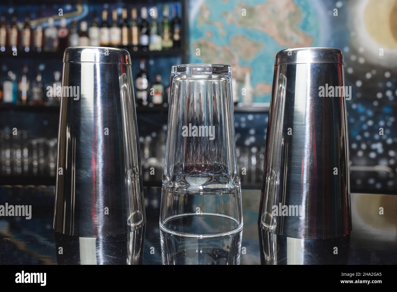 2 shakers of bar instruments for mixing and preparing alcoholic