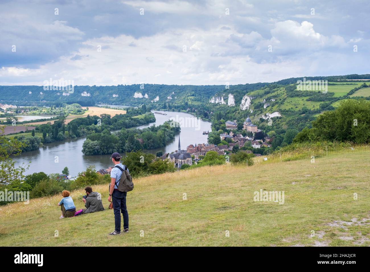 Les Andelys (northern France): panoramic view of the town from the top of the fortified castle “Chateau Gaillard”. Tourists looking at the village, th Stock Photo