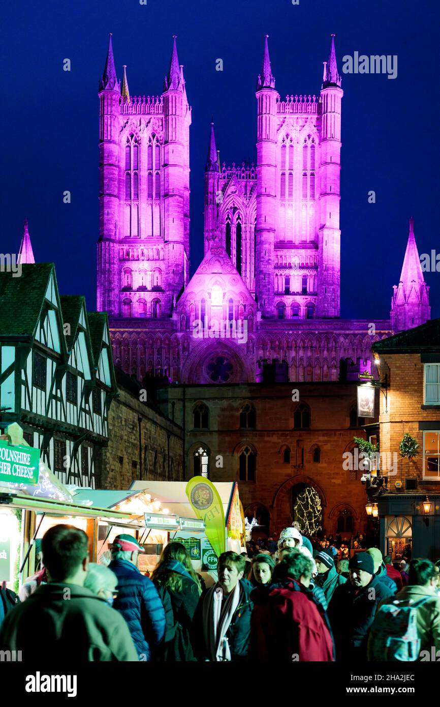 Lincoln Cathedral is floodlit for the annual Christmas market. Visitors