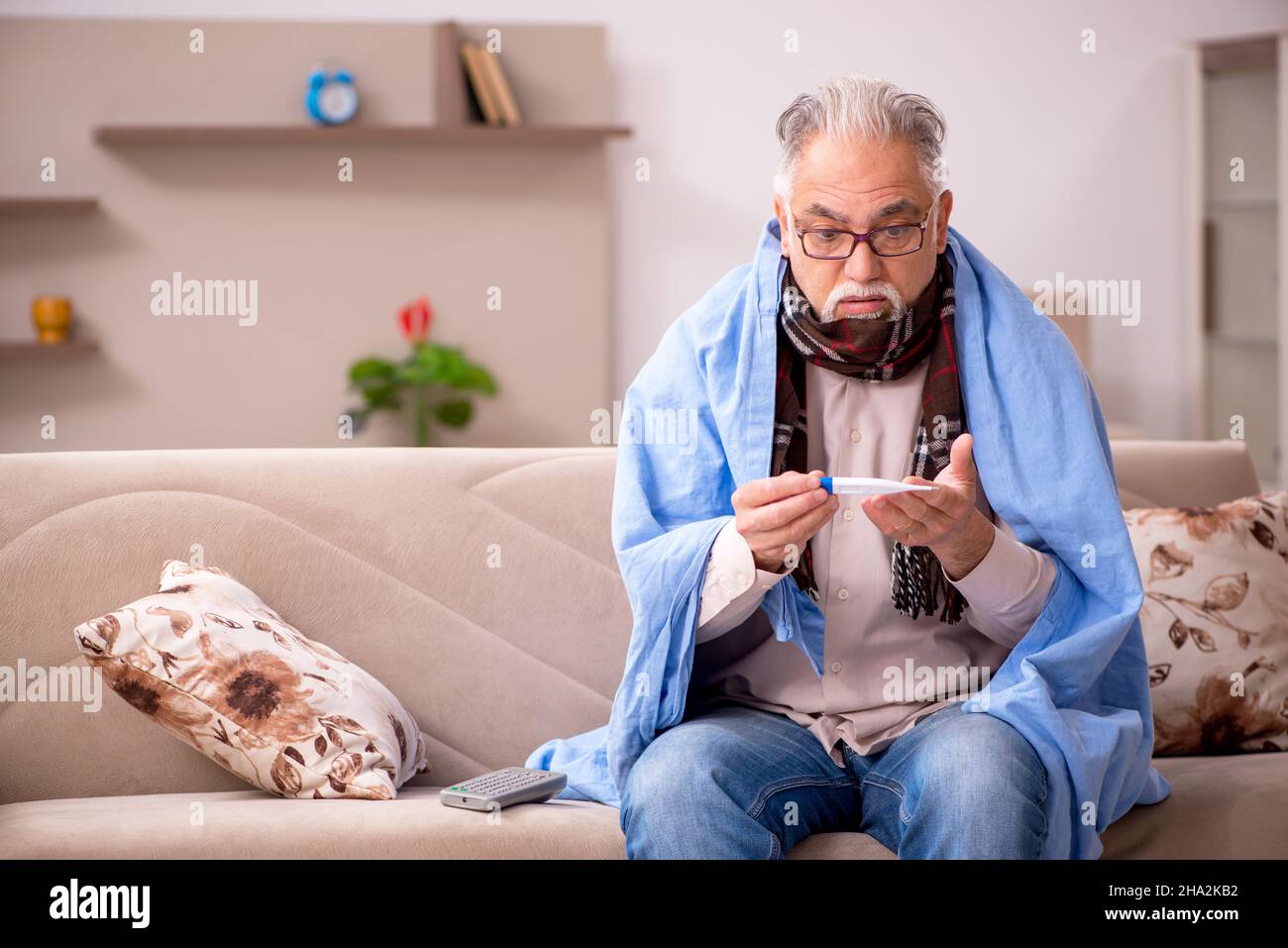 Sick old man coughing sitting hi-res stock photography and images - Alamy