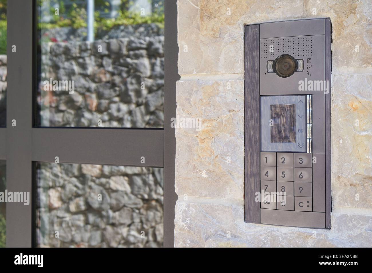 Intercom with video surveillance and combination lock. Stock Photo