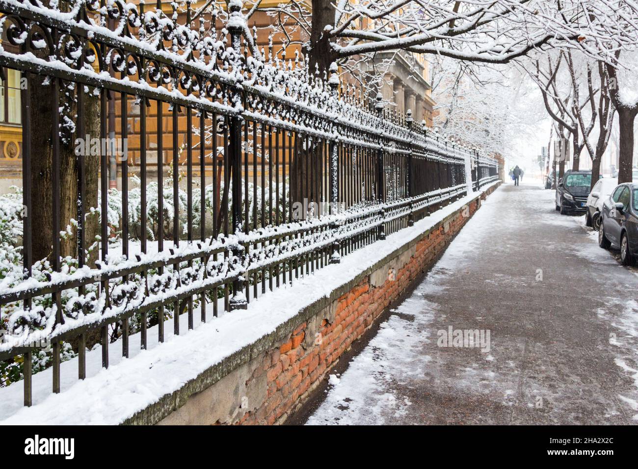 Wrought iron fence covered in snow, Sopron, Hungary Stock Photo - Alamy
