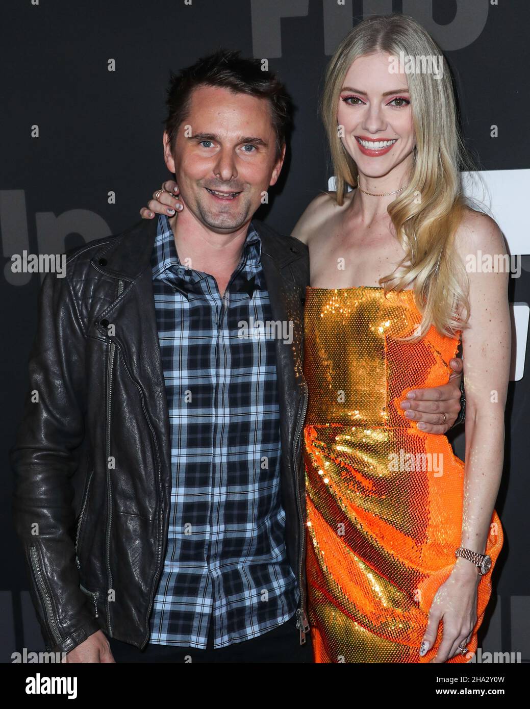 HOLLYWOOD, LOS ANGELES, CALIFORNIA, USA - DECEMBER 09: Singer Matt Bellamy and wife/model Elle Evans Bellamy arrive at the Flip Grand Launch Event Hosted by Grammy-Nominated Artist Halsey with Performances by Scout Willis, BIA, and Kehlani held at Avalon Hollywood on December 9, 2021 in Hollywood, Los Angeles, California, United States. (Photo by Xavier Collin/Image Press Agency) Stock Photo