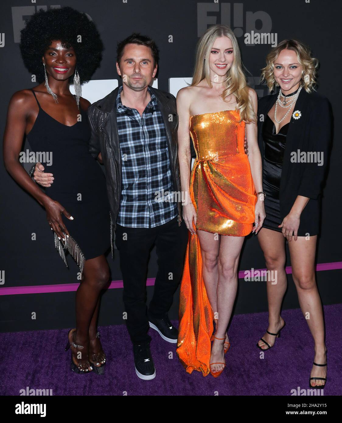 Hollywood, United States. 09th Dec, 2021. HOLLYWOOD, LOS ANGELES, CALIFORNIA, USA - DECEMBER 09: Singer Matt Bellamy and wife/model Elle Evans Bellamy arrive at the Flip Grand Launch Event Hosted by Grammy-Nominated Artist Halsey with Performances by Scout Willis, BIA, and Kehlani held at Avalon Hollywood on December 9, 2021 in Hollywood, Los Angeles, California, United States. (Photo by Xavier Collin/Image Press Agency) Credit: Image Press Agency/Alamy Live News Stock Photo