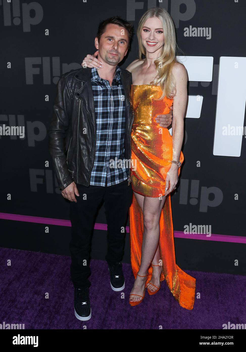 Hollywood, United States. 09th Dec, 2021. HOLLYWOOD, LOS ANGELES, CALIFORNIA, USA - DECEMBER 09: Singer Matt Bellamy and wife/model Elle Evans Bellamy arrive at the Flip Grand Launch Event Hosted by Grammy-Nominated Artist Halsey with Performances by Scout Willis, BIA, and Kehlani held at Avalon Hollywood on December 9, 2021 in Hollywood, Los Angeles, California, United States. (Photo by Xavier Collin/Image Press Agency) Credit: Image Press Agency/Alamy Live News Stock Photo