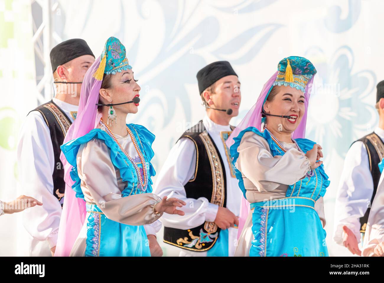 06 July 2021, Ufa, Russia: Tatar National Ensemble in traditional clothes dances and sings Stock Photo