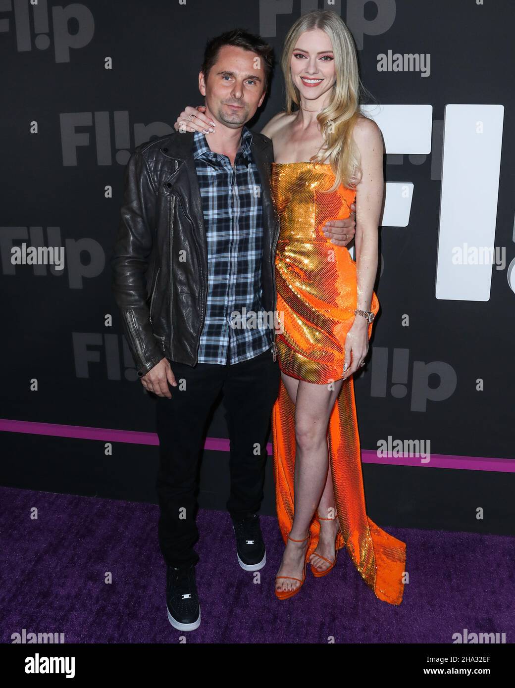 HOLLYWOOD, LOS ANGELES, CALIFORNIA, USA - DECEMBER 09: Singer Matt Bellamy and wife/model Elle Evans Bellamy arrive at the Flip Grand Launch Event Hosted by Grammy-Nominated Artist Halsey with Performances by Scout Willis, BIA, and Kehlani held at Avalon Hollywood on December 9, 2021 in Hollywood, Los Angeles, California, United States. (Photo by Xavier Collin/Image Press Agency/Sipa USA) Stock Photo
