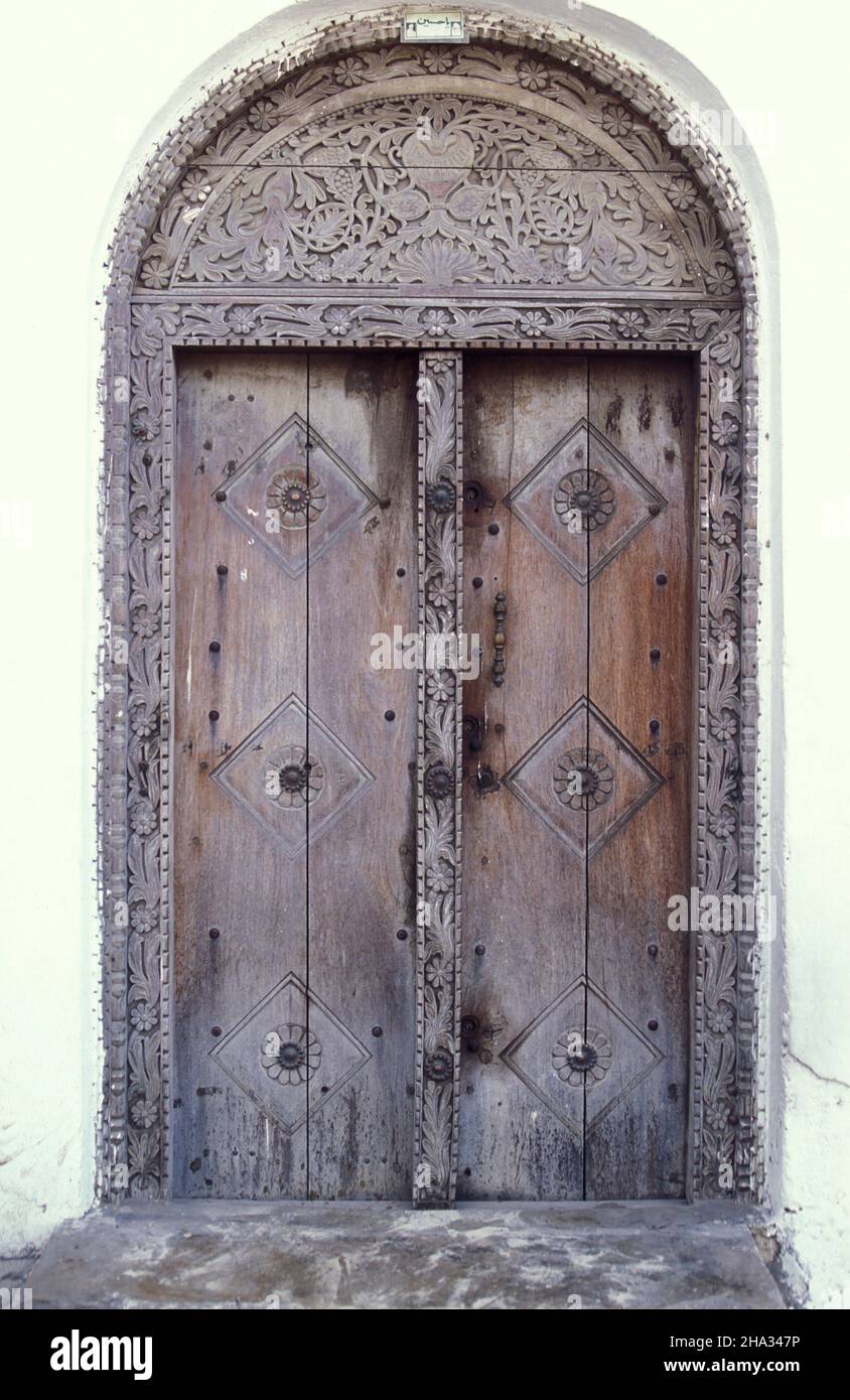 Decorated wooden door in a house in Stone Town, Stone Town, Zanzibar City