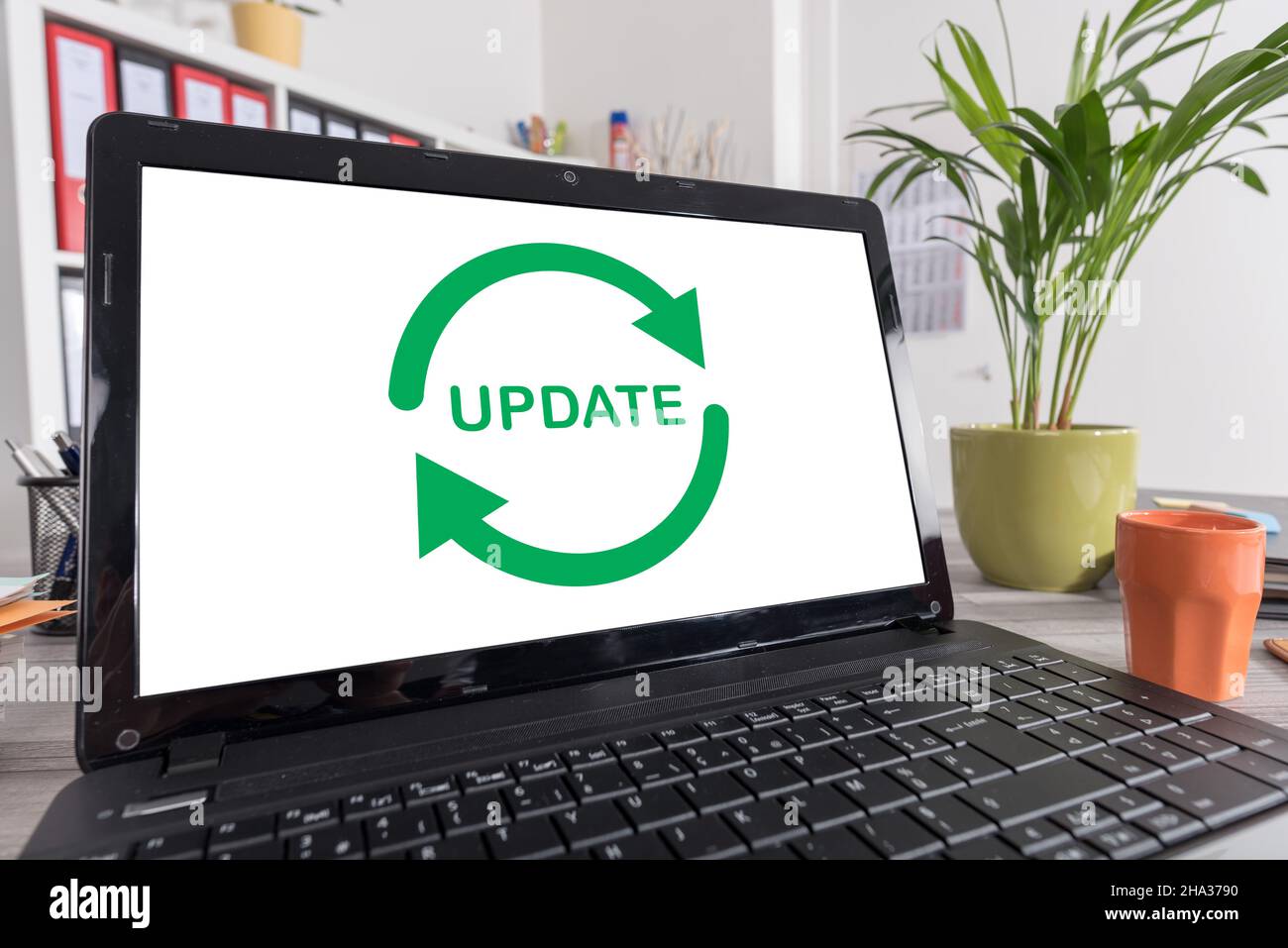 Laptop screen with update concept Stock Photo - Alamy