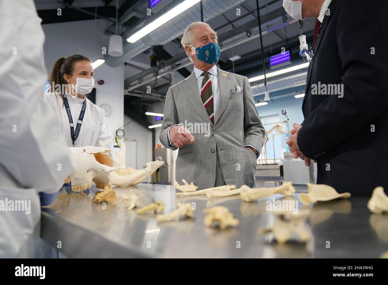 The Prince of Wales talks to students during a visit to open