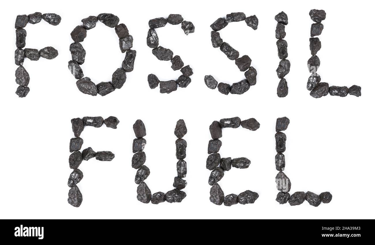 Fossil fuel inscription made from black stone coal isolated on white