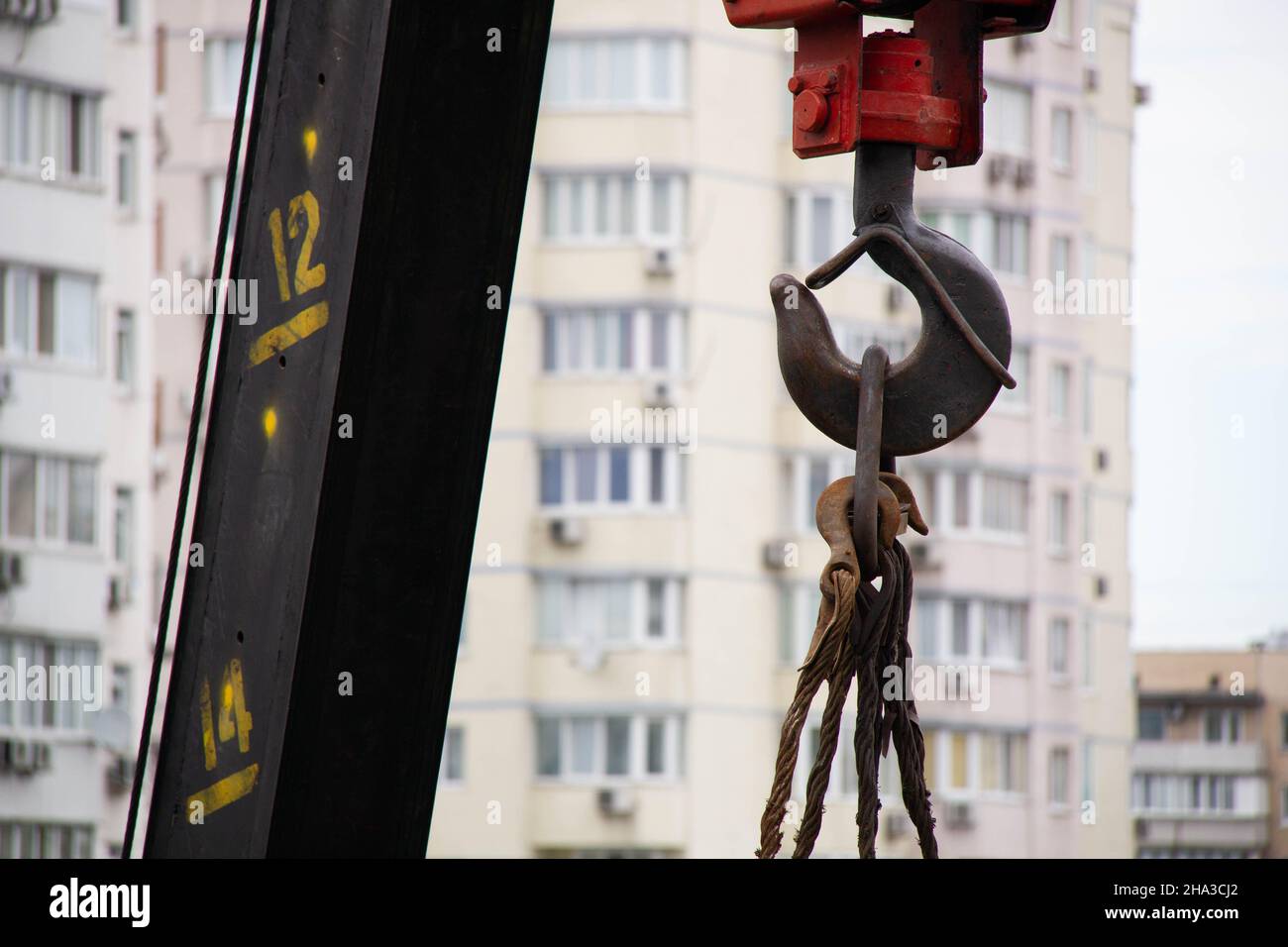Crane hook. Tower Crane Hoist Rope against the blue sky and new