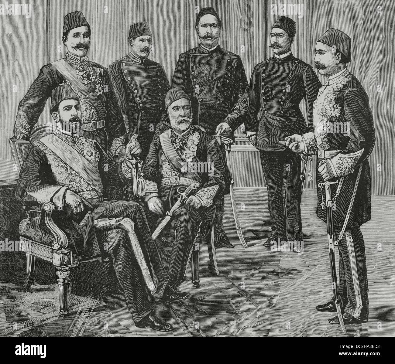Egyptian financial and political crisis. The Khedive of Egypt, Tewfik Pasha (1852-1892) and the main leaders of the nationalist party (opposed to the intervention of foreign powers in Egyptian politics). From left to right: Tewfik Pasha (Mohammad Tewfik), Mustafa Pasha, Ali Fahmi (Bey), Mohamed Sherif Pasha, Ahmed Orabi (Bey), Abdallah Helmi Pasha and Fakhri Pasha. Engraving. La Ilustración Española y Americana, 1882. Stock Photo
