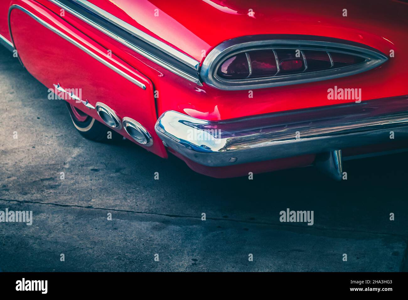 vintage classic car in a colorful street of old town. Travel and