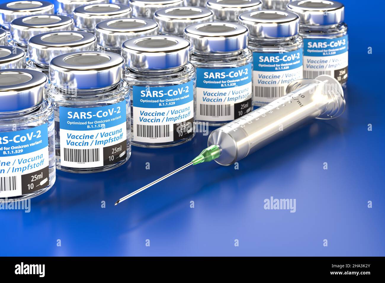 A Vaccine against the SARS-CoV-2 variant B.1.1.529 Omicron: Bottles of vaccination and Syringe. The word vaccination in English, Spanish, French and G Stock Photo