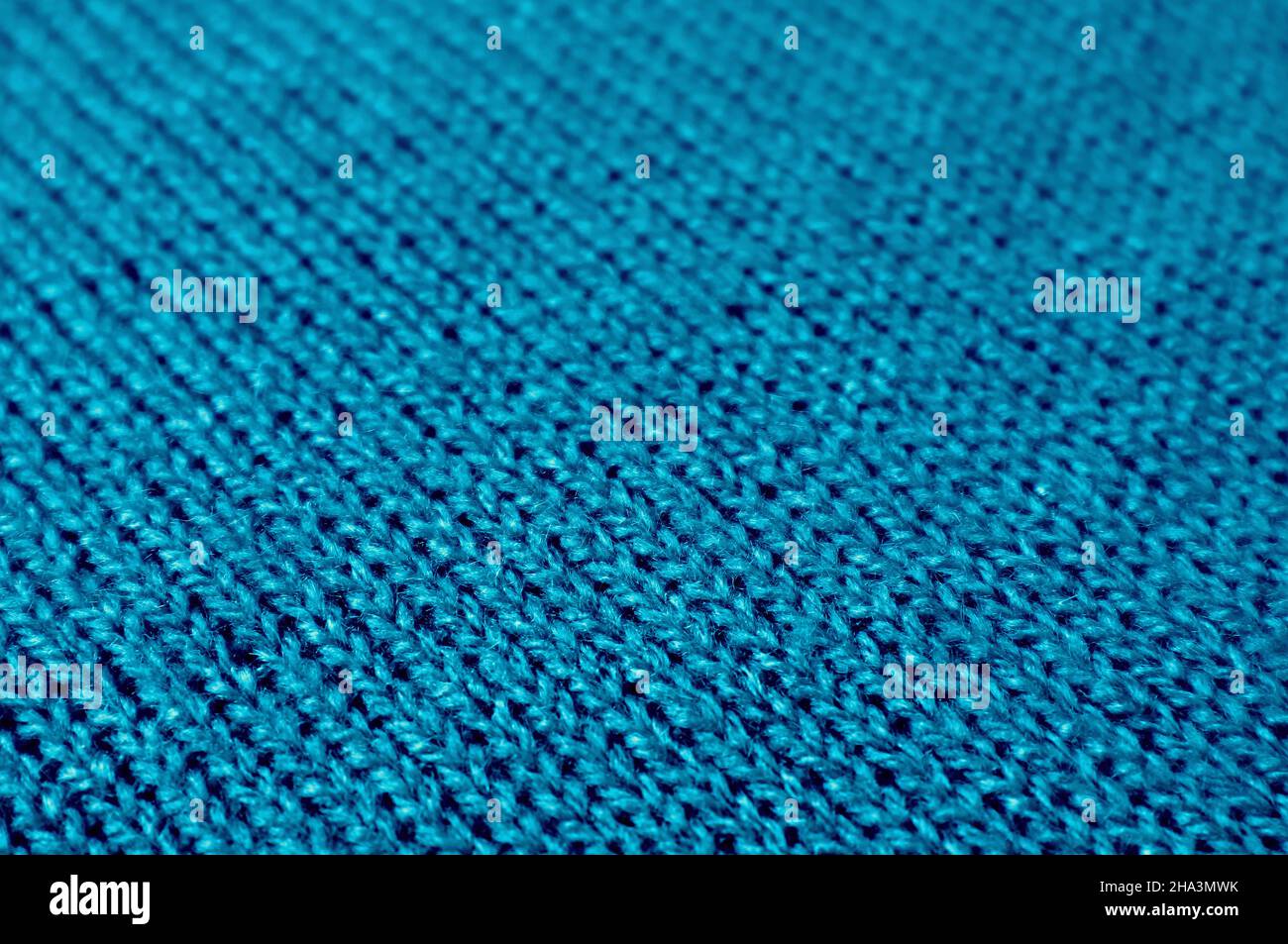 Atlantic Blue Knitted Wool Fabric in Diagonal Patterns for Abstract Background Stock Photo