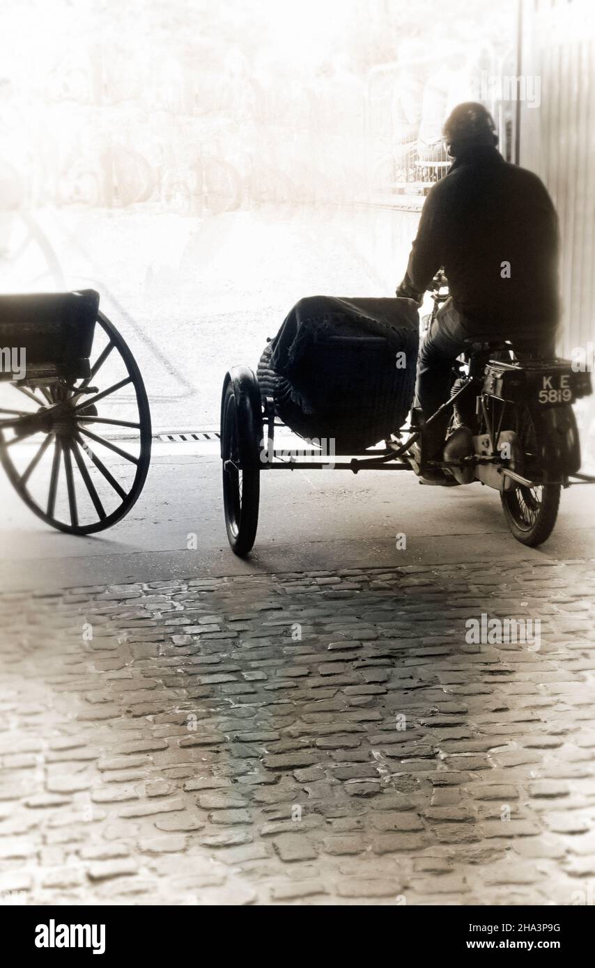 vintage motorcycle and sidecar with rider Stock Photo - Alamy