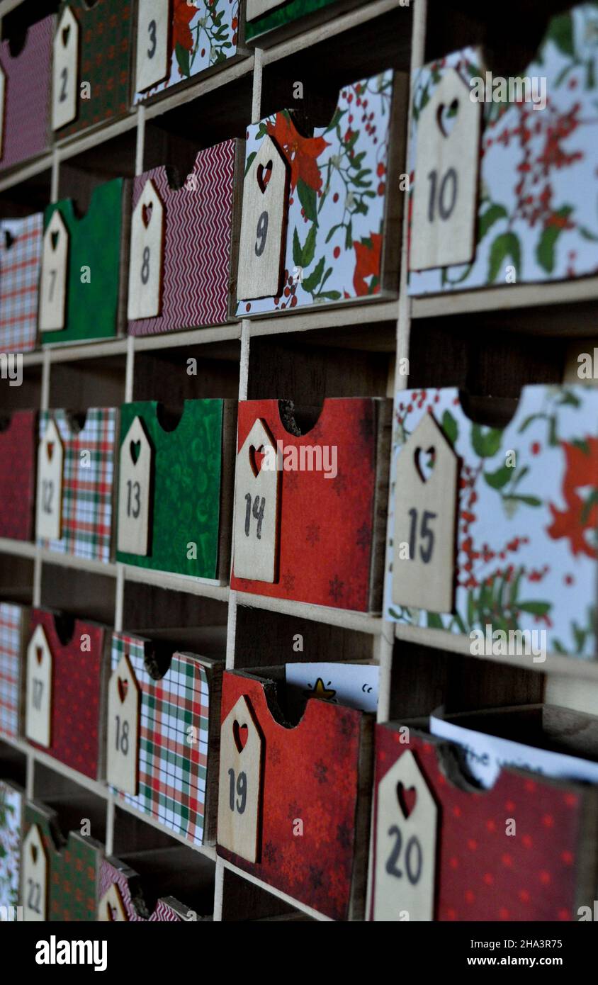 Wooden advent calendar with pull out drawers for each day Stock Photo