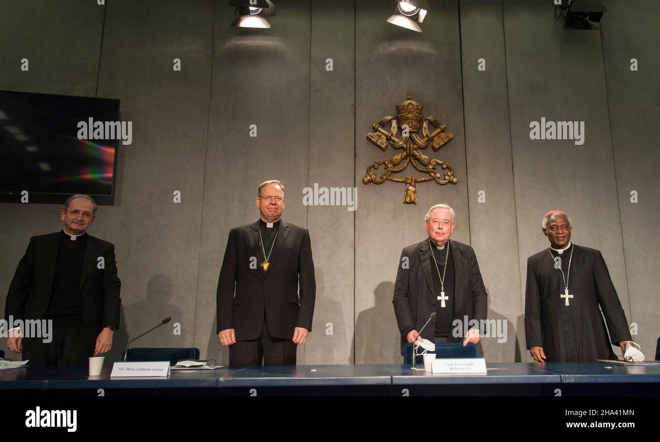 Rome, Italy. 10th Dec, 2021. Italy, Rome, Vatican, 21/12/10. from lefte: Msgr. Stanislav Zvolensky, Msgr. Gintaras Grusas, Card. Jean-Claude Hollerich and Card. Peter Kodwo Appiah Turkson, during the press conference to present the 3rd edition of the European Catholic Social Days, at the Holy See Press Office.Photo by Massimiliano MIGLIORATO/Catholic Press Photo Credit: Independent Photo Agency/Alamy Live News Stock Photo