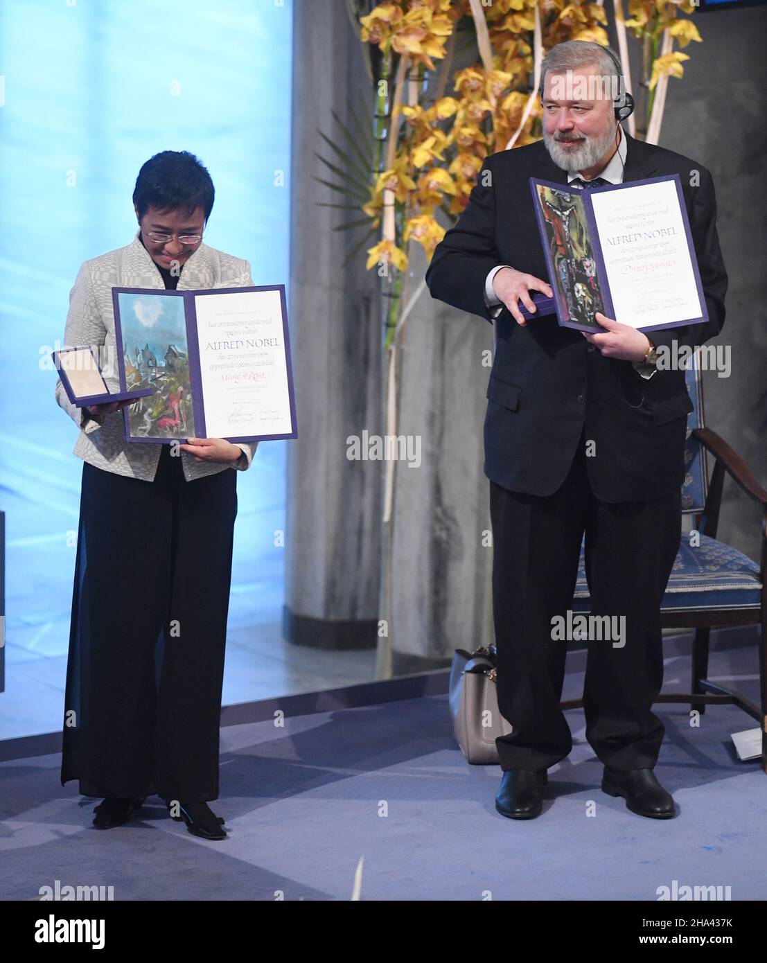 Oslo, Norway. 10th Dec, 2021. Nobel Peace Prize laureates Russian journalist Dmitry Muratov and Filipino journalist Maria Ressa attend the Nobel Peace Prize Award Ceremony at City Hall in Oslo on December 10, 2021. Photo by Rune Hellestad/ Credit: UPI/Alamy Live News Stock Photo