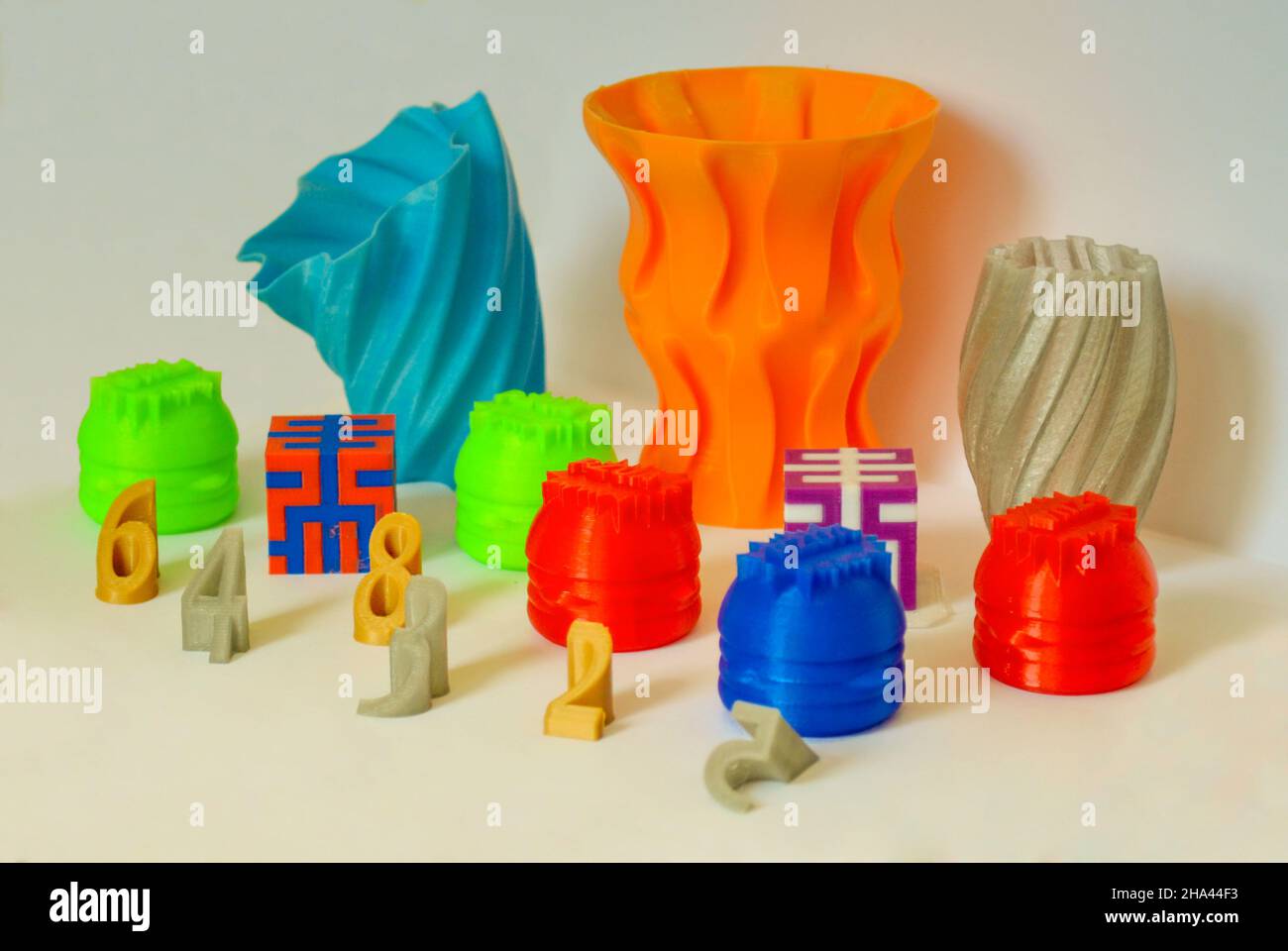 Models printed by 3d printer. Colorful objects printed 3d printer Stock Photo