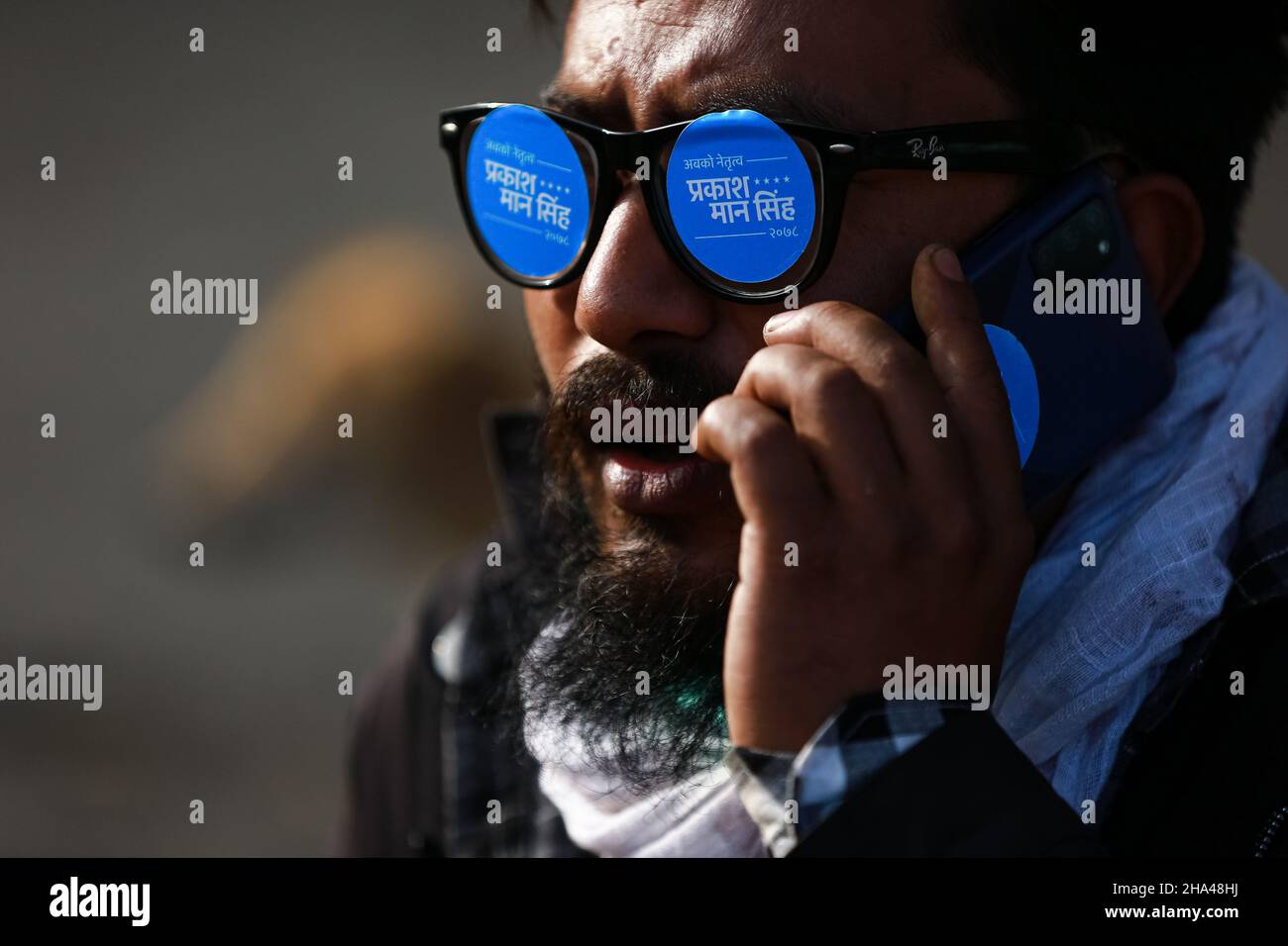 Kathmandu, Bagmati, Nepal. 10th Dec, 2021. Man wears a glass with