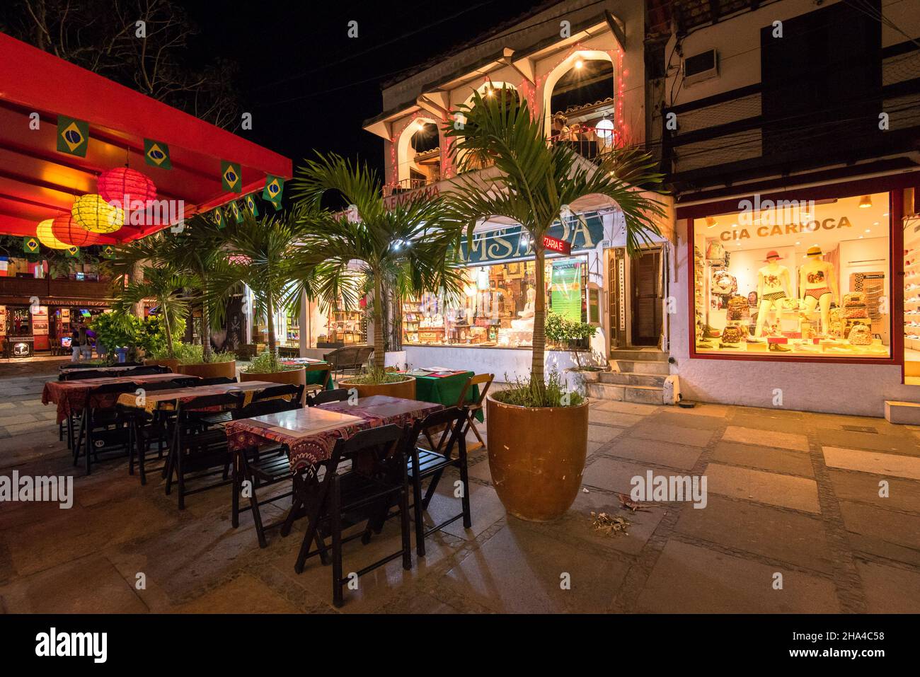 Buzios, Brazil - July 24, 2018: Tables of the restaurant in the street awaiting for guests. Stock Photo