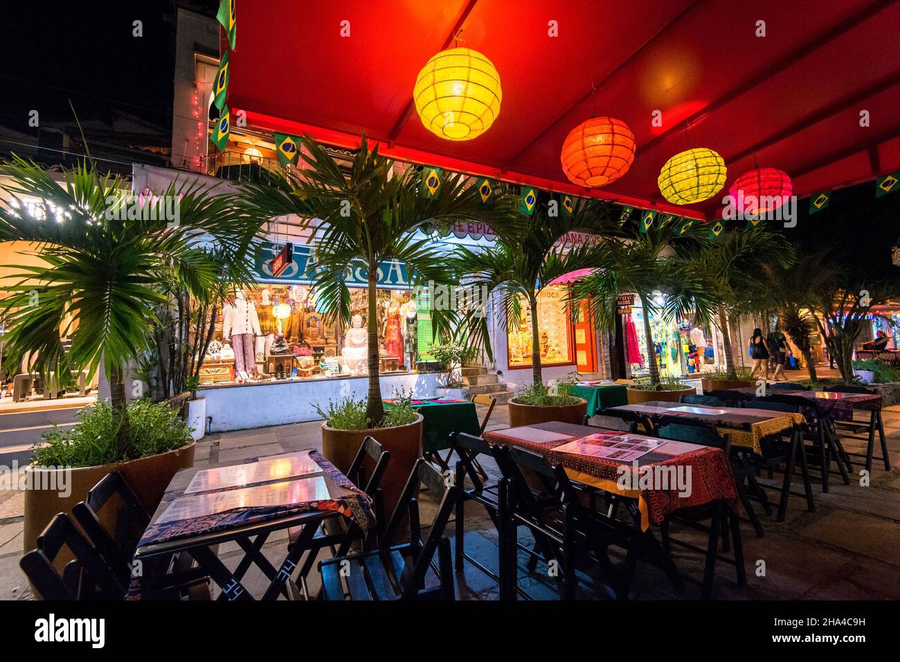 Buzios, Brazil - July 24, 2018: Tables of the restaurant in the street awaiting for guests. Stock Photo