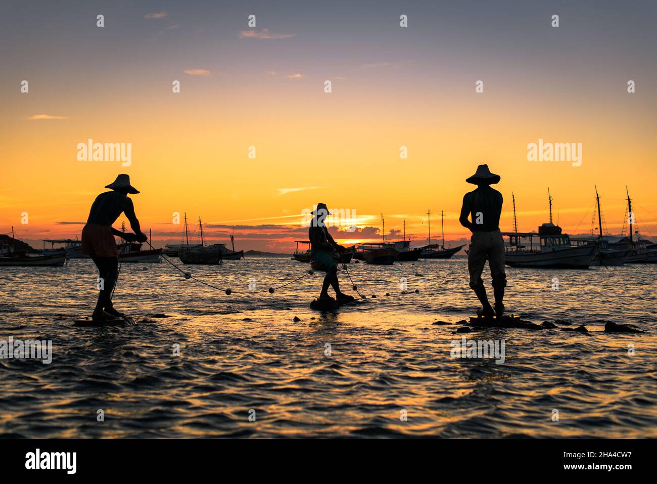 Buzios, Brazil - July 27, 2018: Sculpture of the three fishermen by artist Christina Motta in the city of Buzios is among the 26 most beautiful. Stock Photo