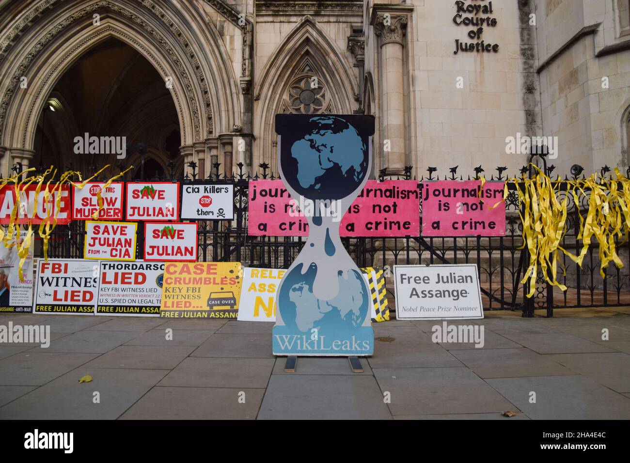 London, UK. 10th Dec, 2021. Protesters gathered outside the Royal Courts of Justice in support of Julian Assange, as the US Government wins its appeal against the decision not to extradite the WikiLeaks founder. Stock Photo